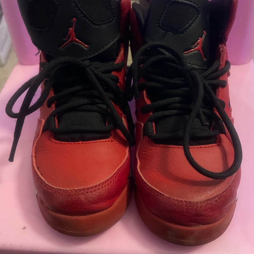 Kids Red and Black Jordan sneakers